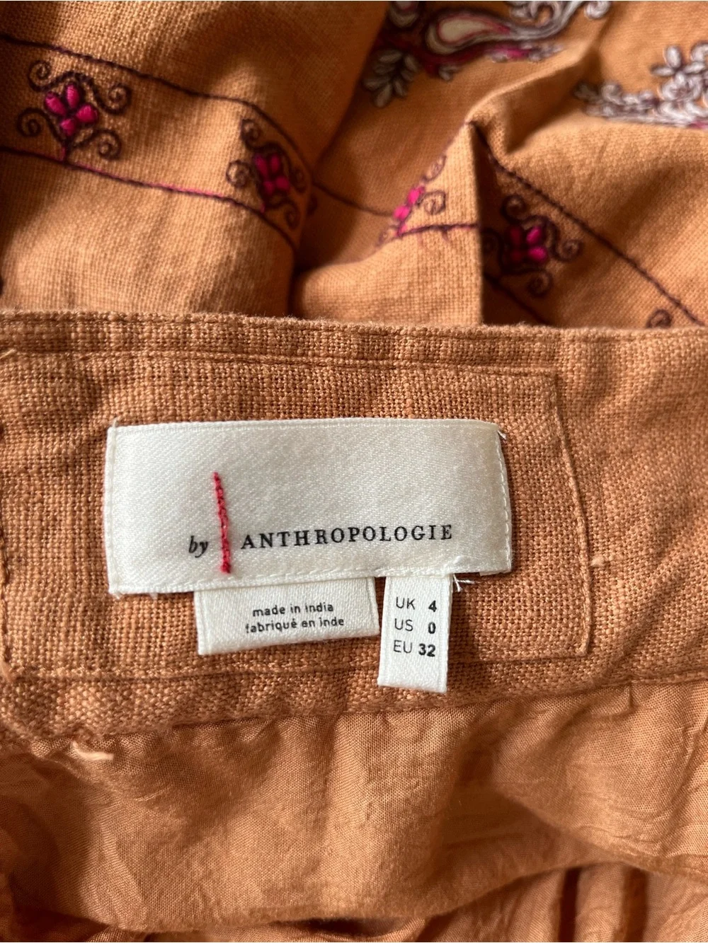 Anthropologie Meghan terracotta embroidered folkloric mini wrap skirt. Size 0